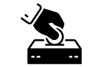 A hand putting a coin into a donation box