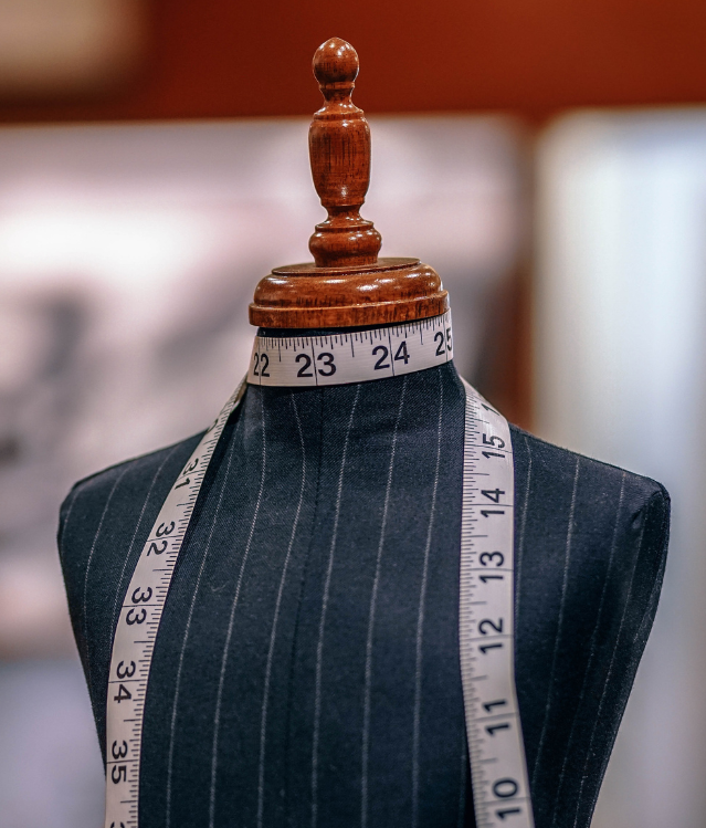 Mannequin with measuring tape wrapped around