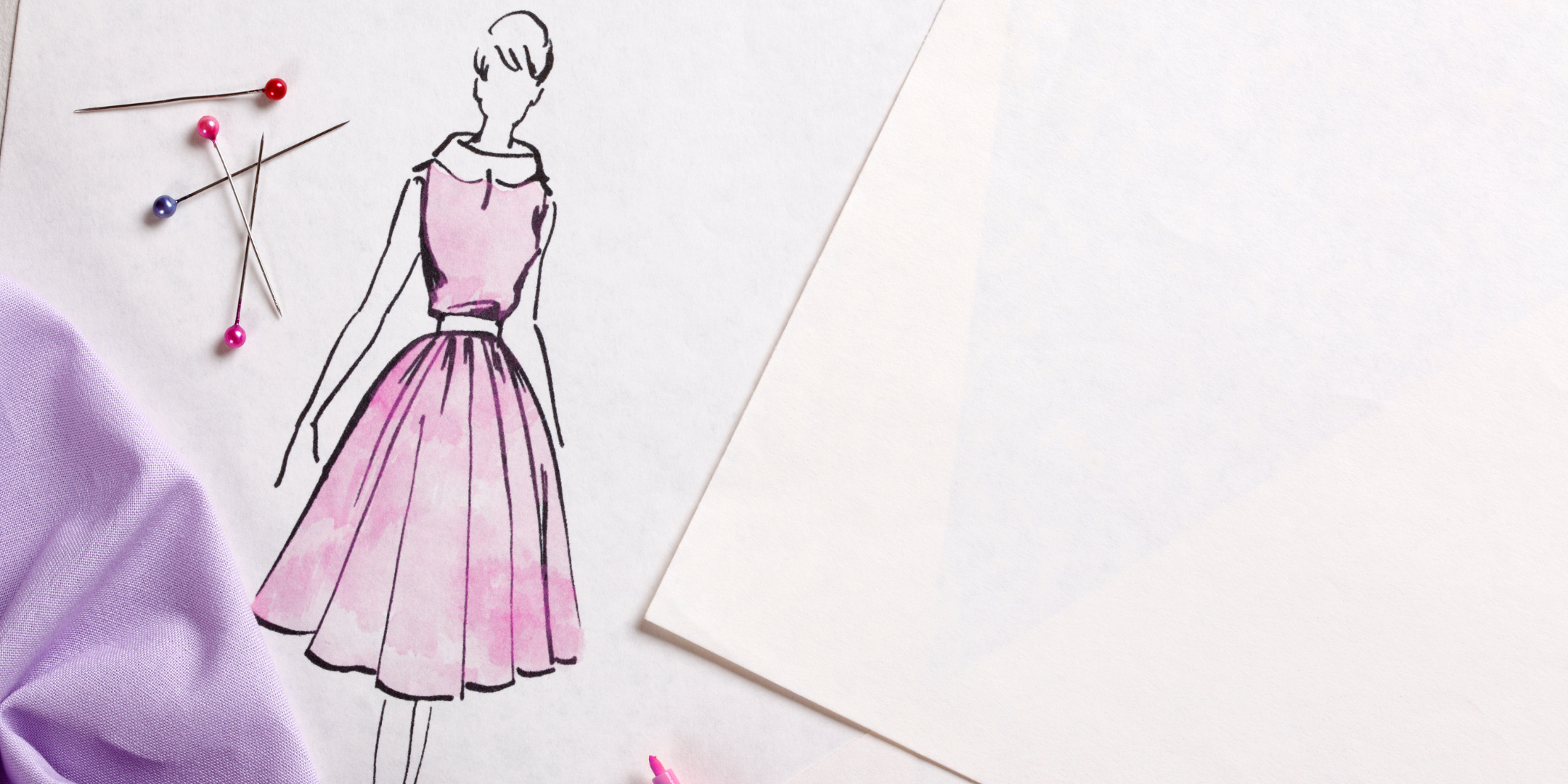 Sketch of woman in pink dress next to some fabric pins