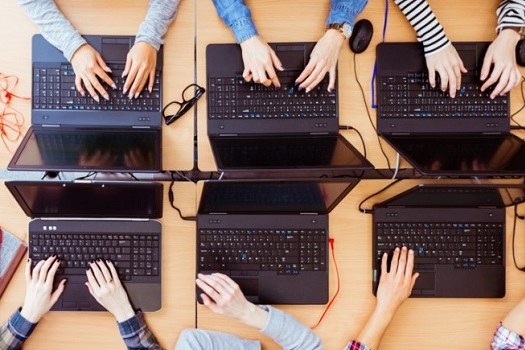 hands and laptops
