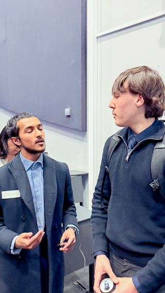 Panel Member Tahmid in conversation with Future Leaders students at the event