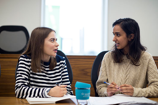 Two Queen Mary law students having a discussion