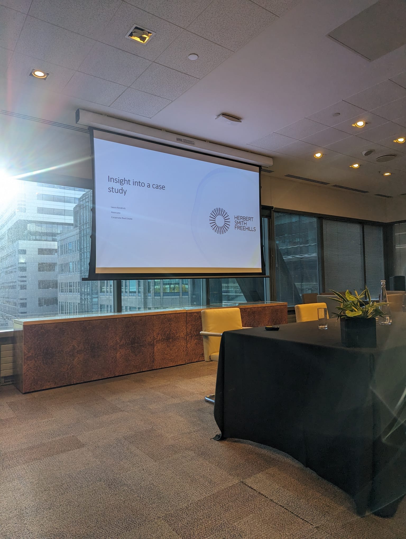 Event space at a law firm with a desk and a view out of the window