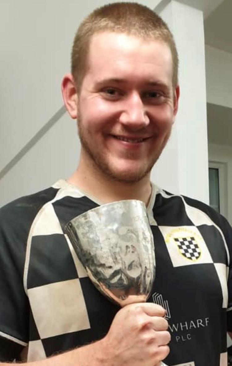 Dominic Morey holding the 2nd XV UH Cup