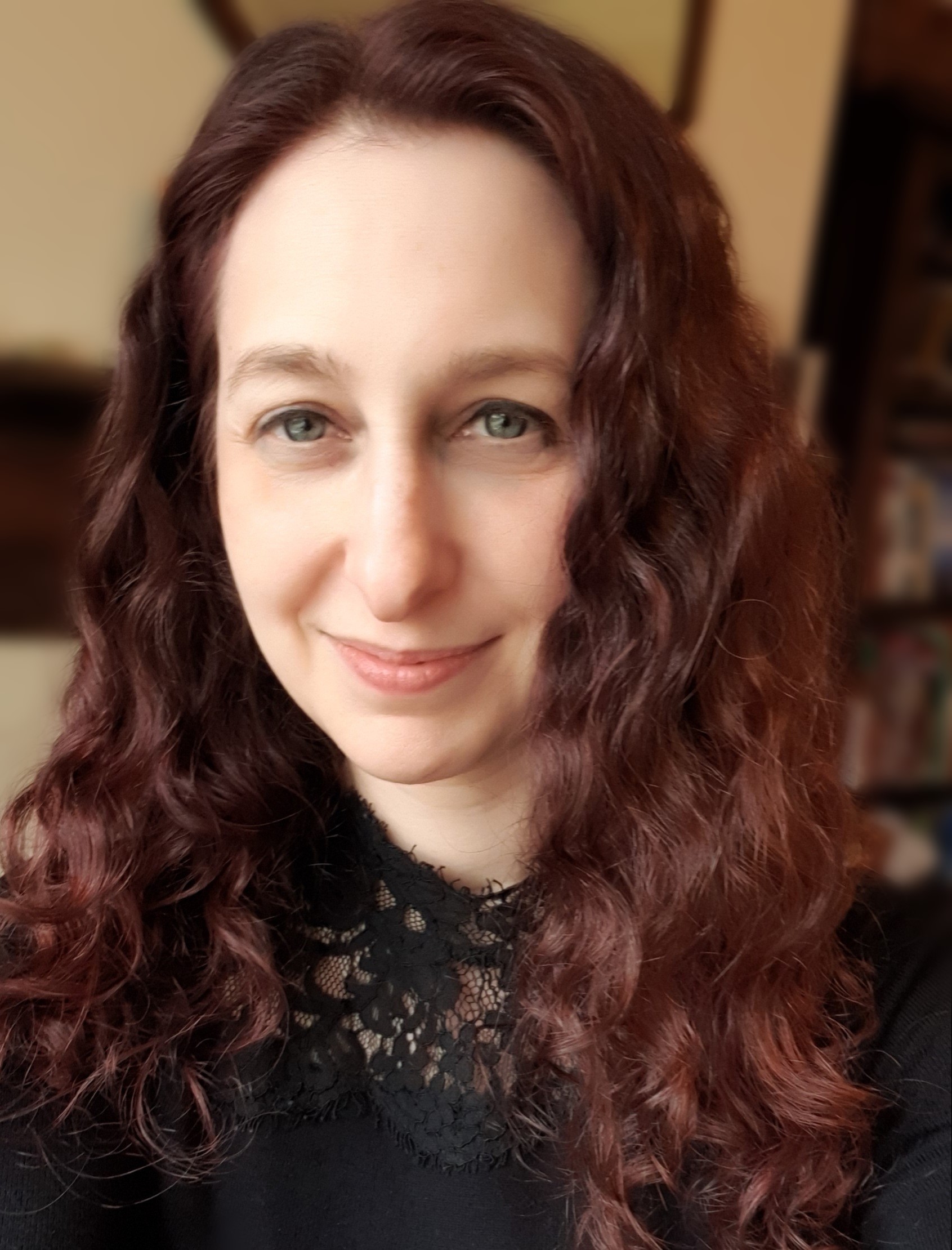 Headshot of Beth Stuart, Beth is smiling into the camera